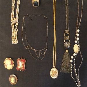 Various gold metal vintage jewelry
